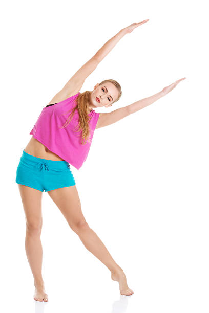 istock Beautiful caucasian woman is doing exercises. 488558009