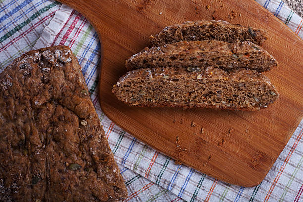istock sliced bread in a linen towel 488558611
