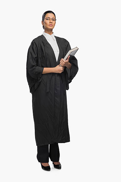 Portrait of a female lawyer holding a book stock photo