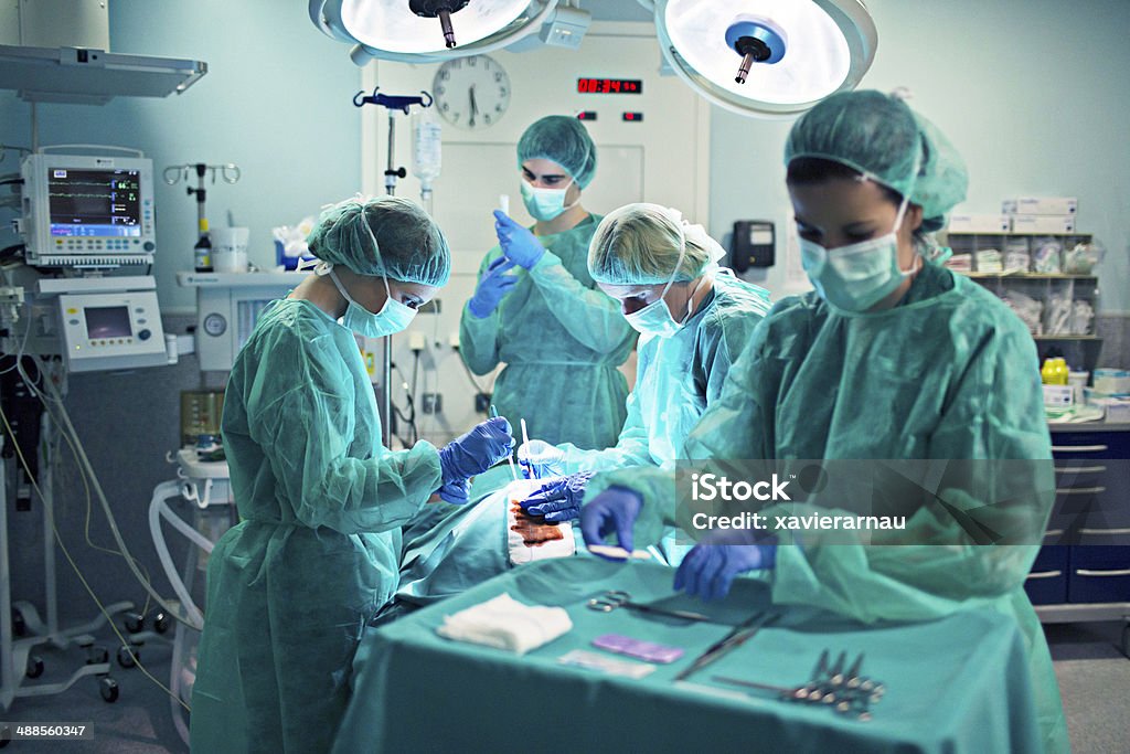 Surgery Medical team working on a surgery. Operating Room Stock Photo