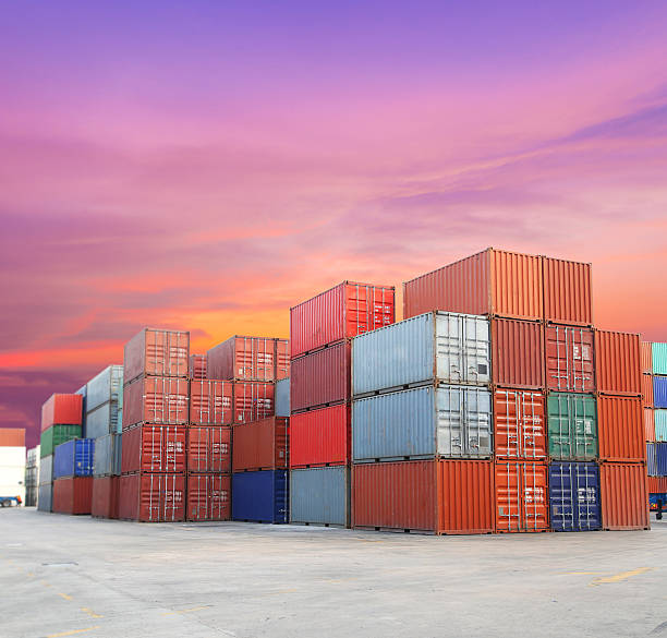 istock Shipping containers at the docks with beautiful sky 488560719