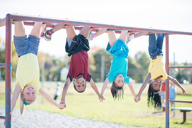 istock Happy Children on the Playground 488560774
