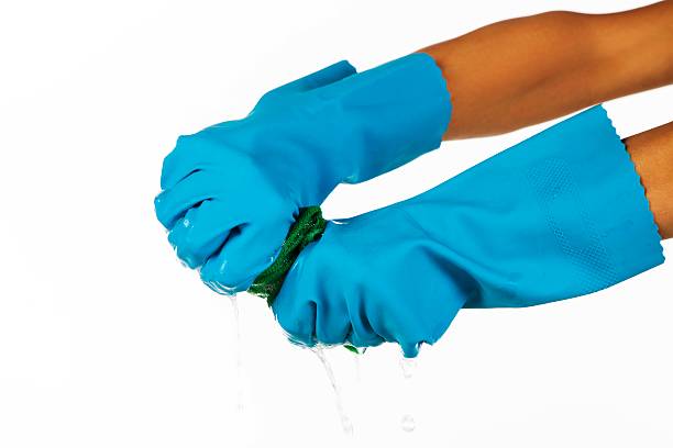 guantes de caucho azul sobre fondo blanco - nonconductor fotografías e imágenes de stock