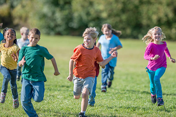 istock Kids Playing Tag at Recess 488561854