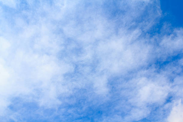 istock Distribution of white clouds on the clear blue sky 488561905