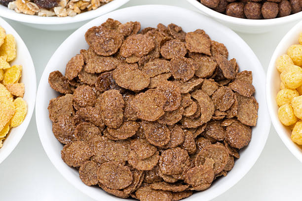 istock chocolate cornflakes and breakfast cereals, top view 488561927