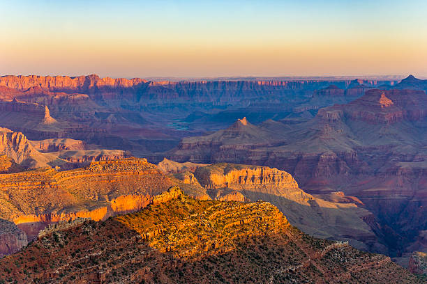 colorful Sunset at Grand Canyon colorful Sunset at Grand Canyon seen from Mathers Point, South Rim yaki point stock pictures, royalty-free photos & images