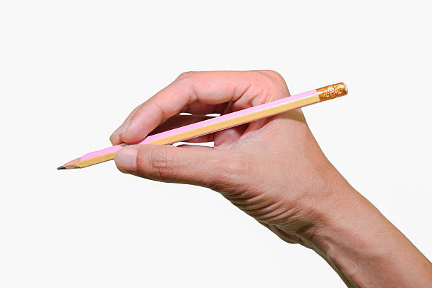istock hand is writing something and pencil with white background and white isolated 488562902