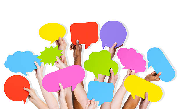 istock Group of Human Arms Raised with Speech Bubble 488563253
