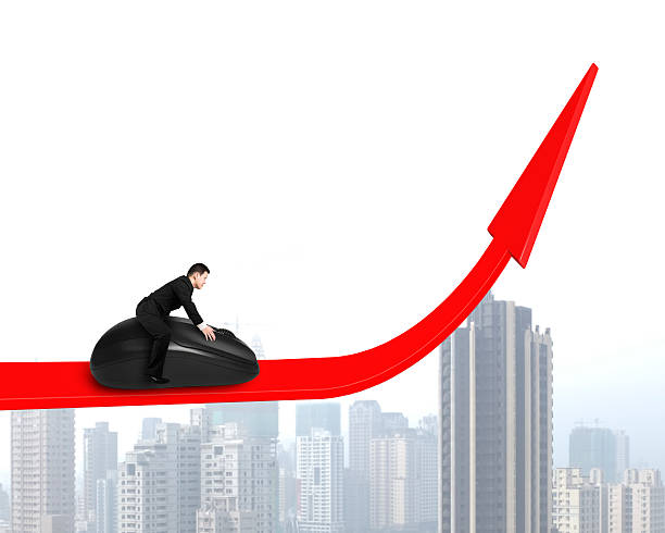 istock Riding computer mouse on growing arrow with city view 488563781