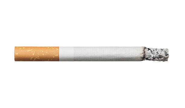 Cigarette Close up of burning cigarette isolated on white background cigarette photos stock pictures, royalty-free photos & images
