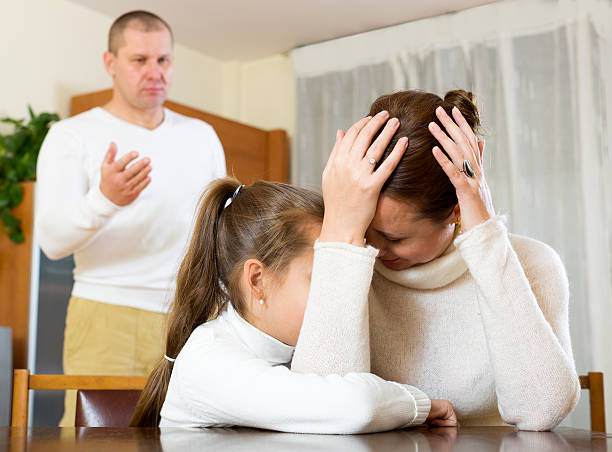 istock mother solace to crying daughter 488569536