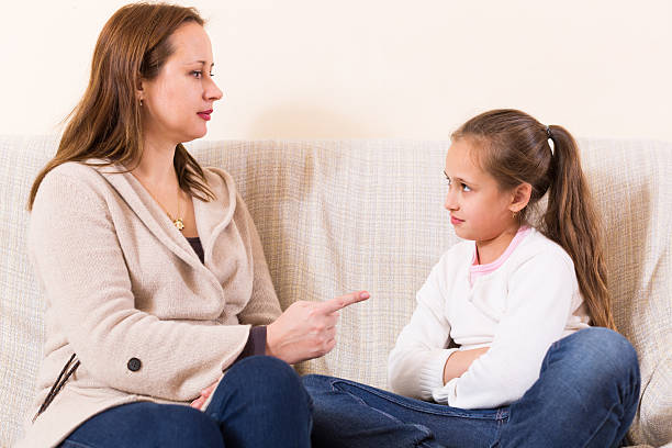 istock Mother scolding little daughter 488569738