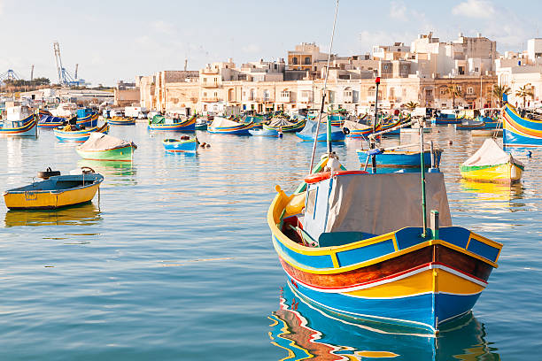 istock Colorful typical boats in Marsaxlokk, Malta. 488570984