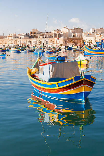 istock Colorful typical boats in Marsaxlokk, Malta. 488571014