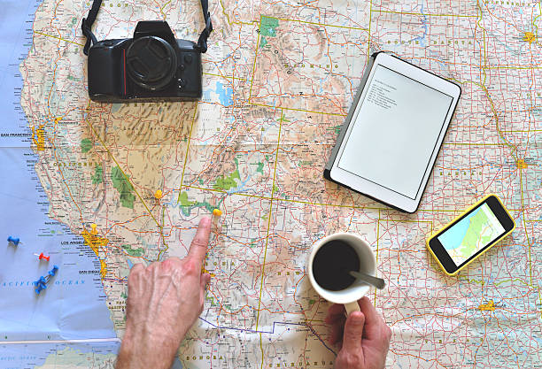istock Young man planning a road trip 488571893