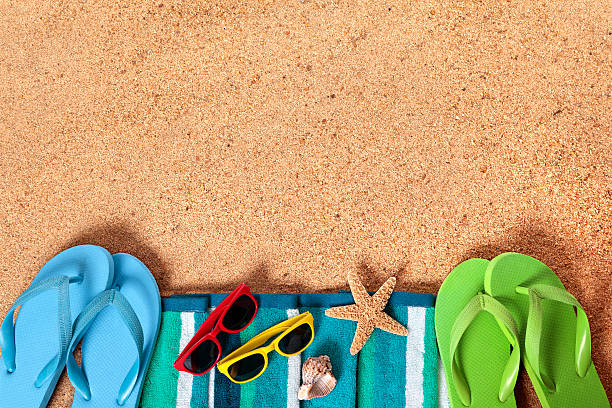 istock Beach border with sunglasses and flip flops 488572777