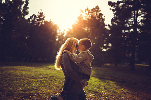 istock mother and son outdoors 488574466