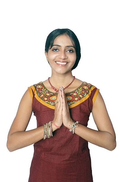 istock Traditional Indian female greeting with a smile. 488574875