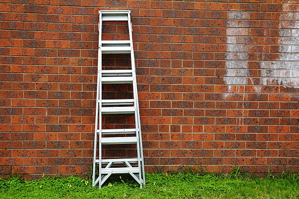 istock Aluminum ladder against the wall. 488575464