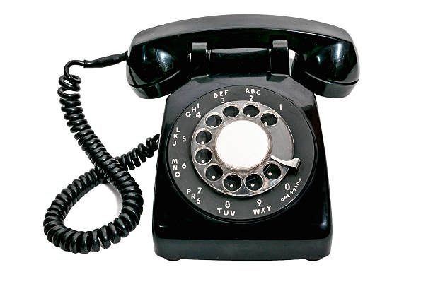 istock Vintage Rotary Dial Black Telephone Isolated 488575780