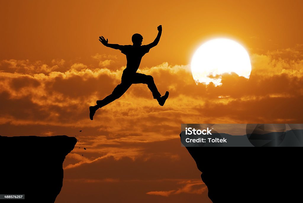 Man jump through the gap. Man jump through the gap. Element of design.  Jumping Stock Photo