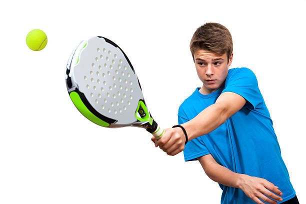 teen paleta player en acción aislados. - paddle ball racket ball table tennis racket fotografías e imágenes de stock