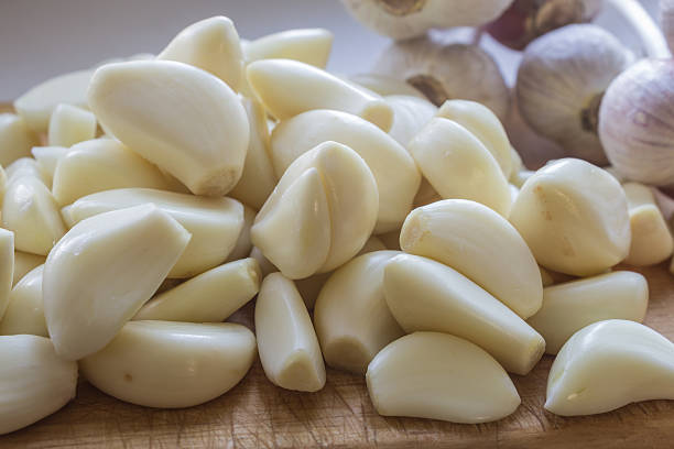 istock Peeled garlic cloves cooking 488577908