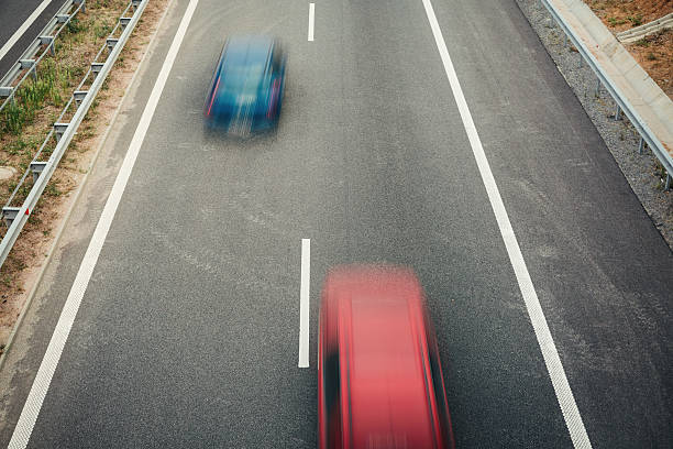 istock Blurred cars on a highway 488578020