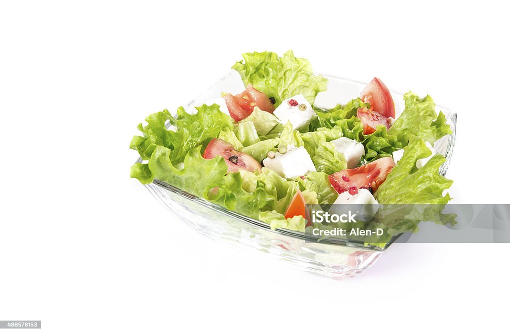 Salat isolated on white background Salat isolated on white background. Close up of a portion healthy food Appetizer Stock Photo