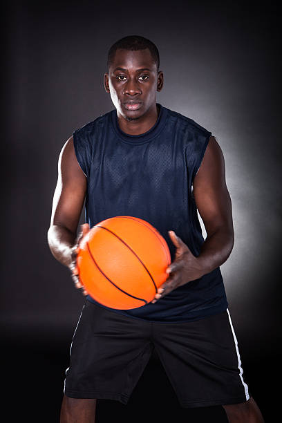istock African Young Man With Basketball 488578716