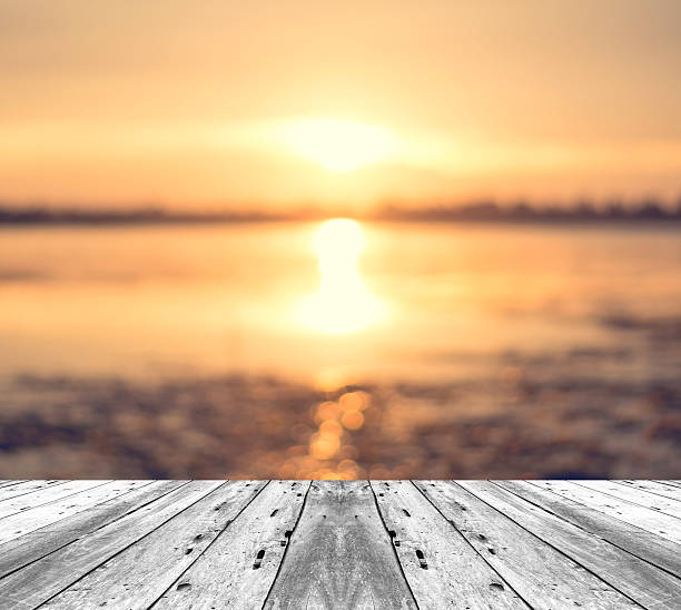 istock old white painted wood in front of sky in evening 488580326