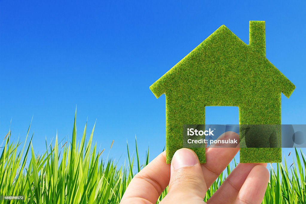 eco house icon concept hand holding eco house icon concept  2015 Stock Photo