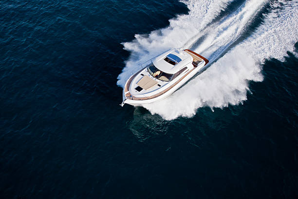 istock Luxurious yacht cruising through the sea 488598608