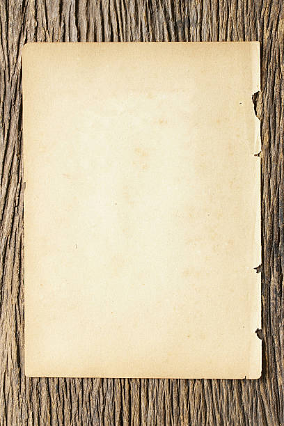 istock Brown paper sheets  on wooden table 488598692