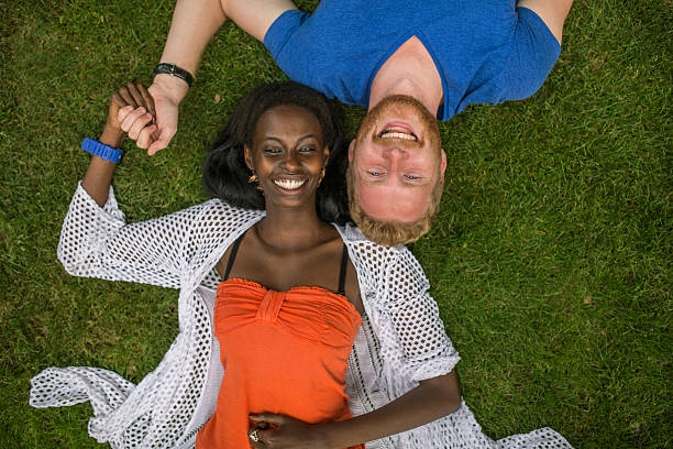 istock Multiracial couple in the park 488599292