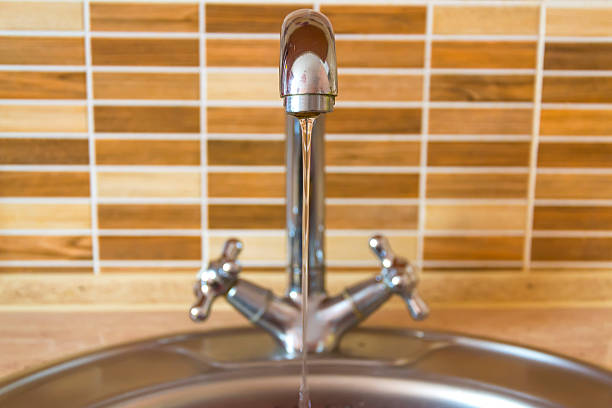 istock jet of water from the tap 488599674