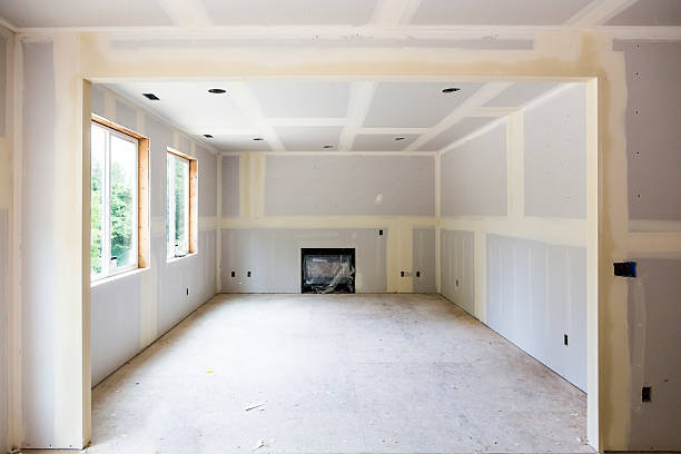 Drywall installation in a new home contruction stock photo