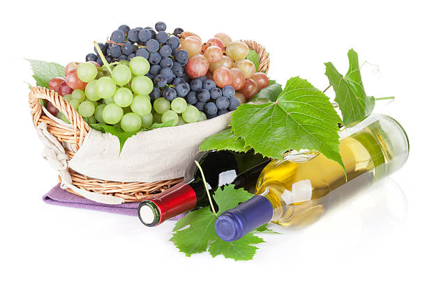 istock White and red wine bottles and grapes 488599816