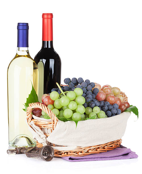 istock White and red wine bottles and grapes 488599842
