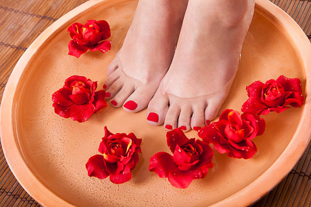 istock Female Feet Getting Aroma Therapy 488600950