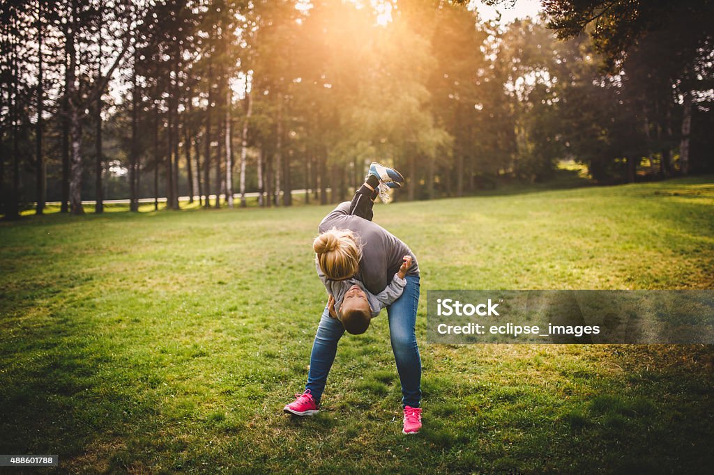 Playing with mom 2015 Stock Photo