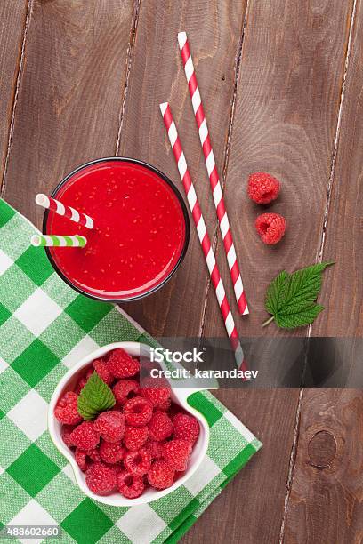 Raspberry Smoothie And Berries In Bowl Stock Photo - Download Image Now - 2015, Above, Backgrounds