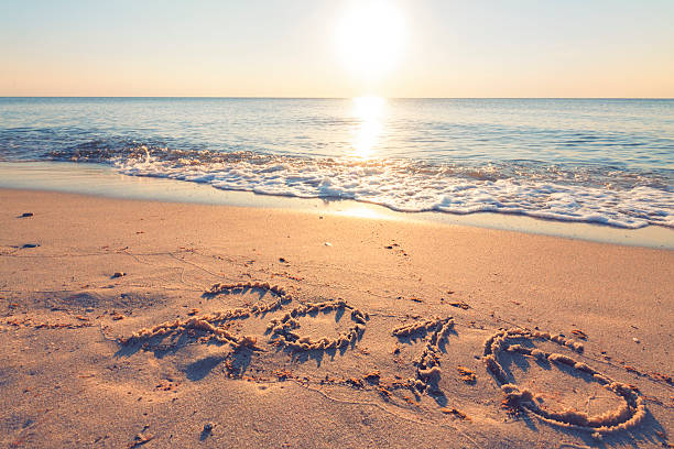 istock New Year 2016 on a beach sand 488602756