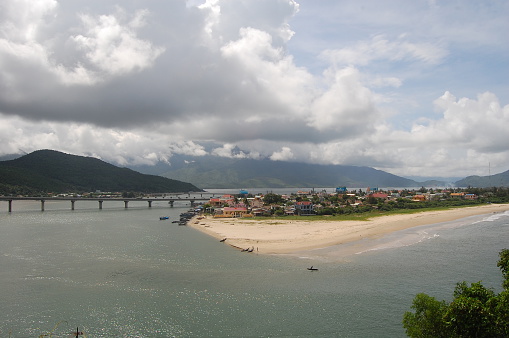 Hue, Vietnam - September 26, 2009: View of Lang Co town and the bridge in Hue, Vietnam. Lang Co has a well known beach and resort.