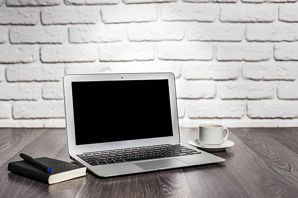 istock Digital tablet computer on old wooden desk. 488610884