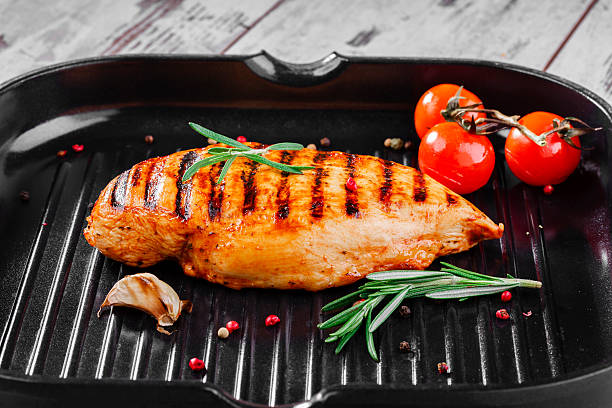 istock grilled chicken fillet in the pan 488611505