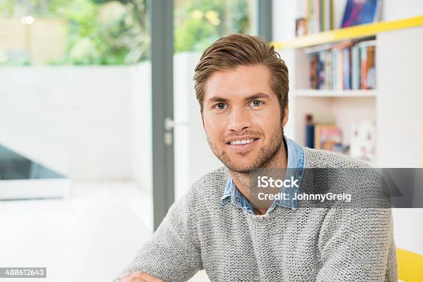 Young Man Smiling At Home Stock Photo - Download Image Now - 20-29 Years, 25-29 Years, Adult
