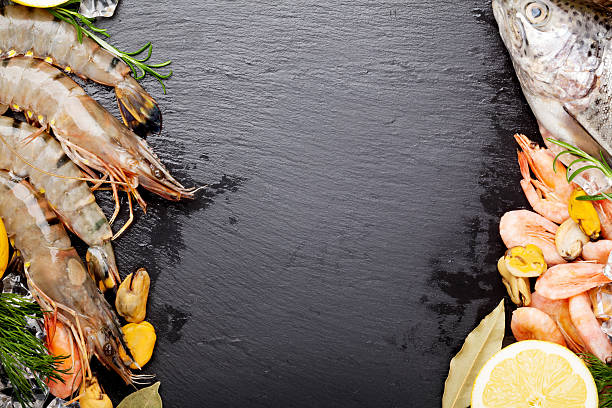 istock Fresh raw sea food with spices 488614240
