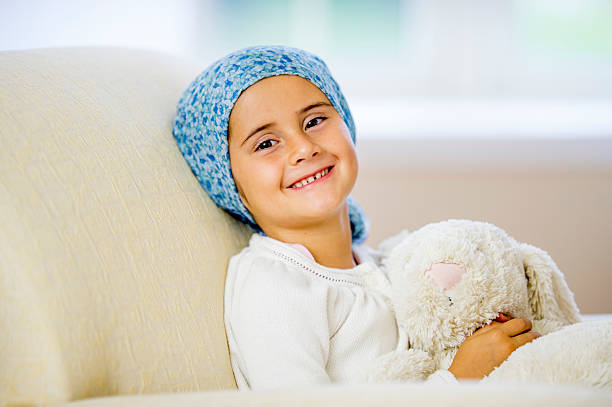 istock Giggling Little Girl Facing Cancer 488615056